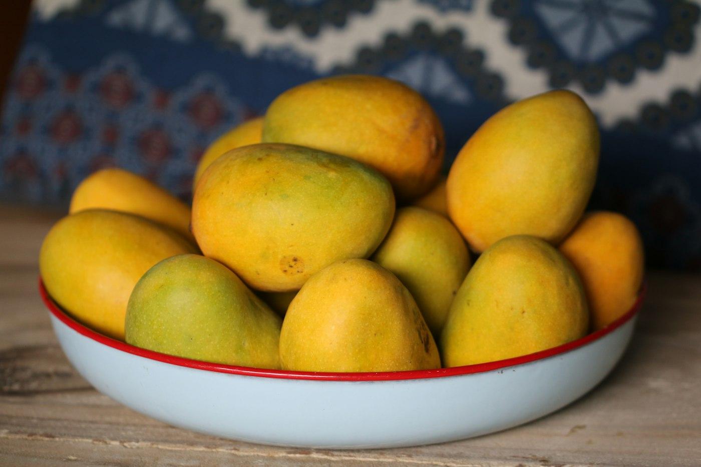 Ripe golden Chaunsa mangoes in a bowl